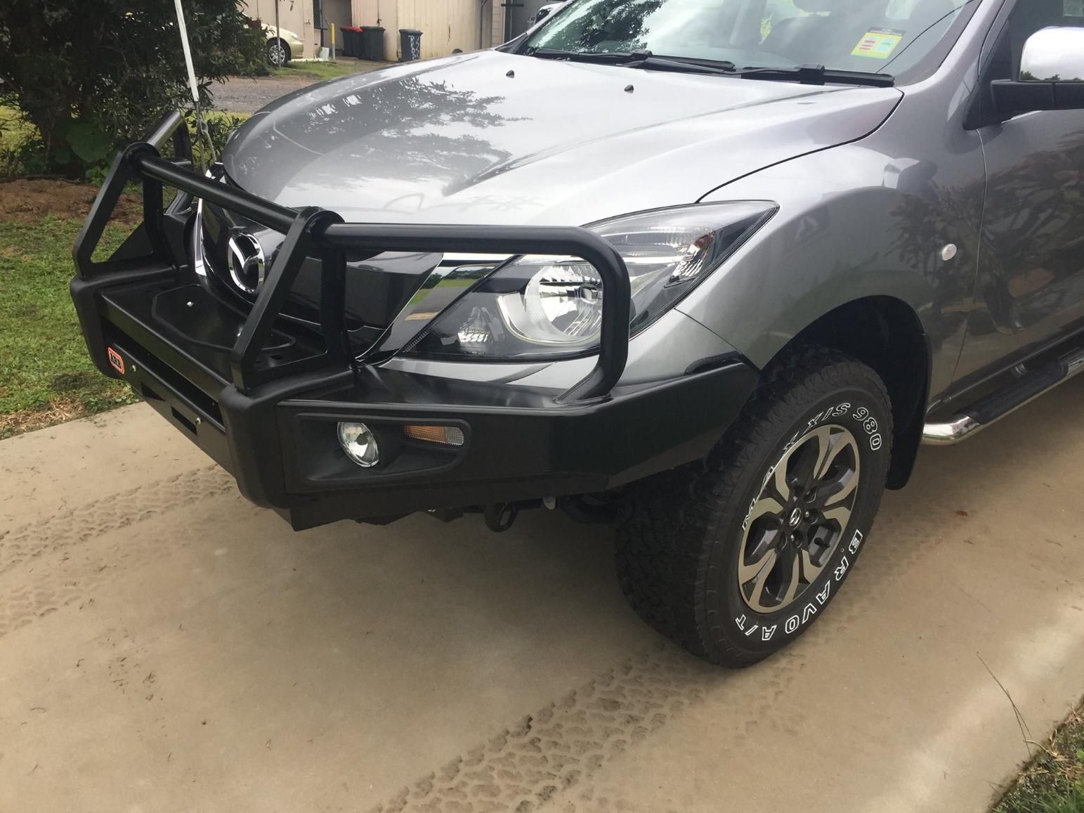 A Gray Truck With A Black Bumper Is Parked On A Sidewalk — Tech Tune Automotive and 4x4 ARB In Innisfail, QLD