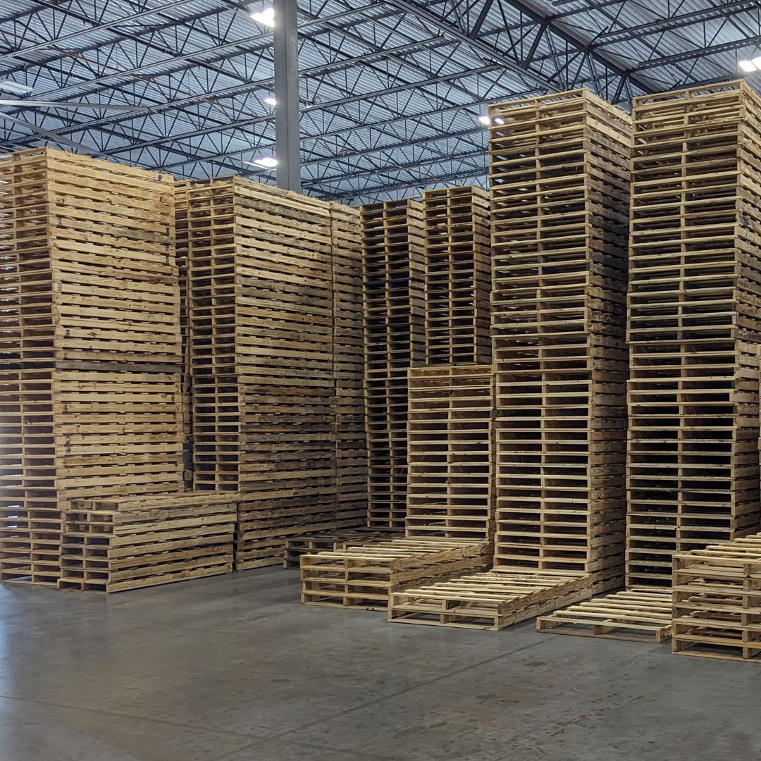 New Wood Pallets stacked in pallet warehouse