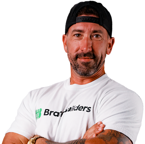 A man wearing a white shirt that says bray builders