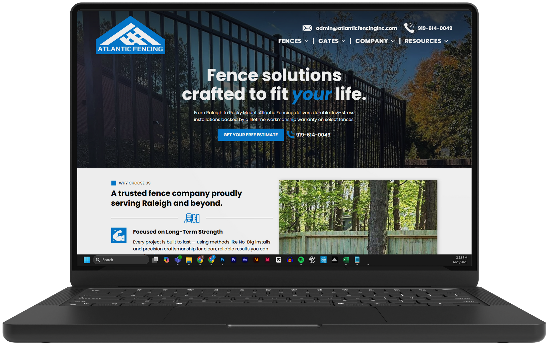 Black laptop displaying a fence company website with a forest background and the headline “Fence solutions crafted to fit your life.”