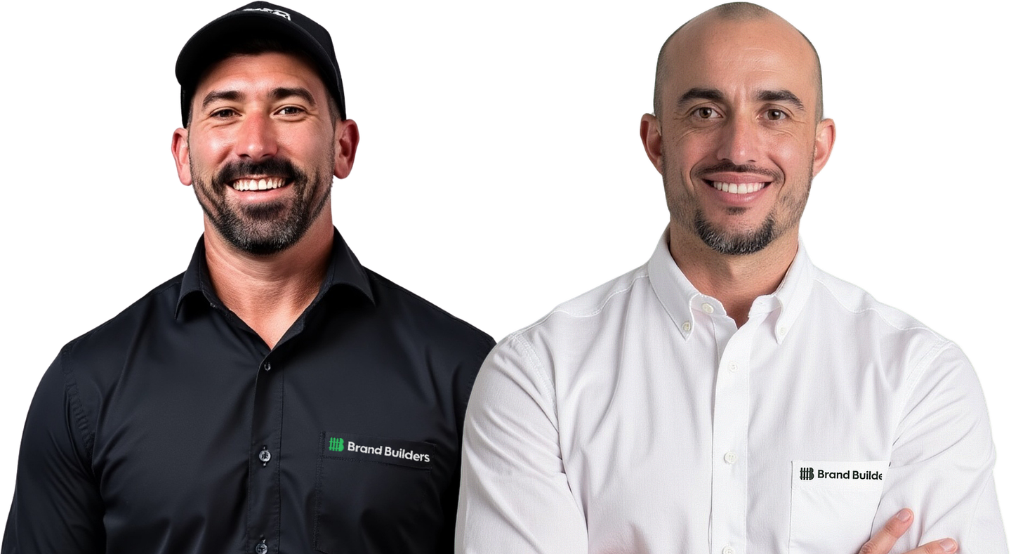 Two men are standing next to each other with their arms crossed and smiling.