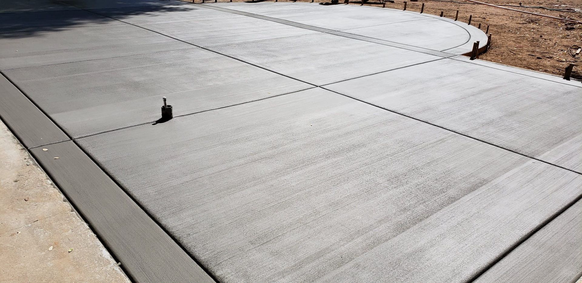 A close up of a road with a lot of dust on it.