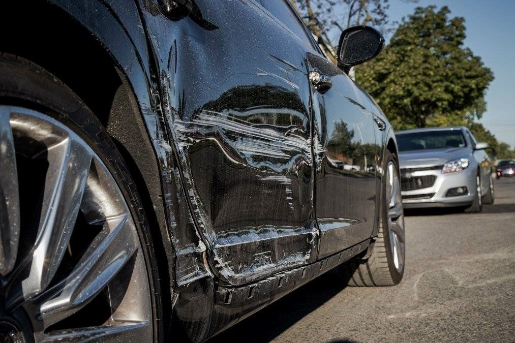 Collision Autobody Repair — Car with Damage Close-up in Birmingham, MI