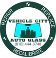 Vehicle City Auto Glass logo: windshield with city silhouette; teal and dark green colors; includes contact phone.