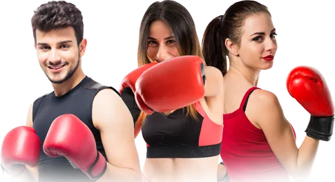 A man and two women are wearing boxing gloves.