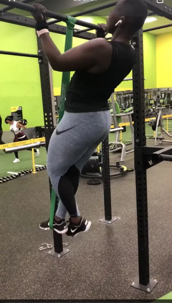 A man is doing pull ups