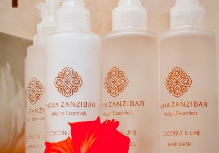 Four bottles of maya zanzibar essentials are lined up next to each other