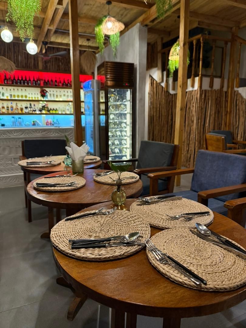 Bottoms Up Bar is located one level below the Bahari Rooftop, offering paranoiac views of stone town.