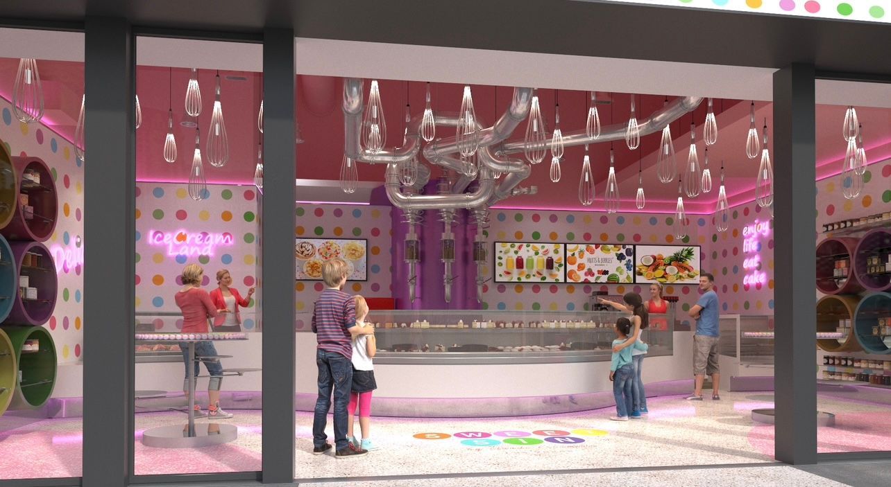 Des gens à l'extérieur d'un magasin de bonbons coloré.