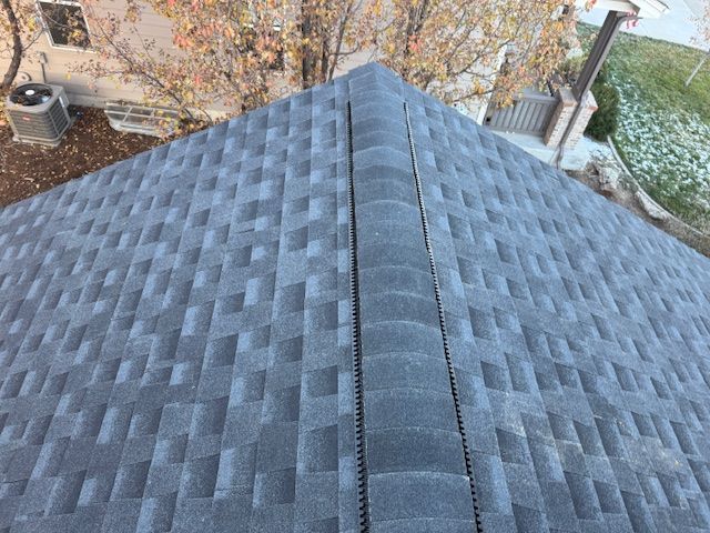 An aerial view of a roof with shingles on it