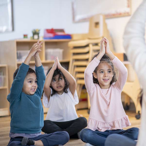 Children Doing Yoga — Mitcham, Vic — Emmikins ELC