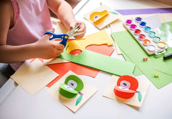 Little Girl Cutting Colorful paper — Mitcham, Vic — Emmikins ELC Little Girl Cutting Colorful paper — Mitcham, Vic — Emmikins ELC