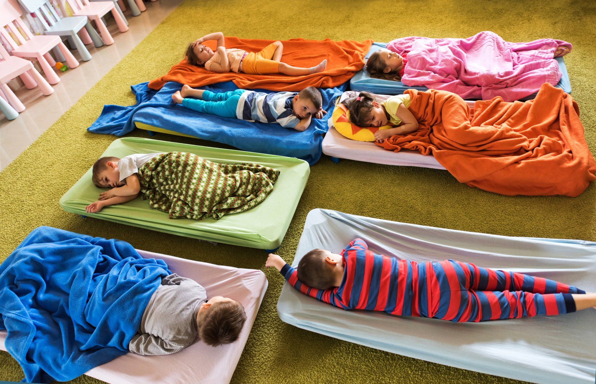 Children Napping On Floor Of Preschool Classroom - Child development in Valparaiso, IN