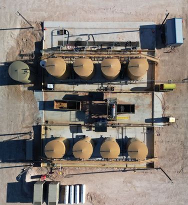 An aerial view of a building with a lot of tanks