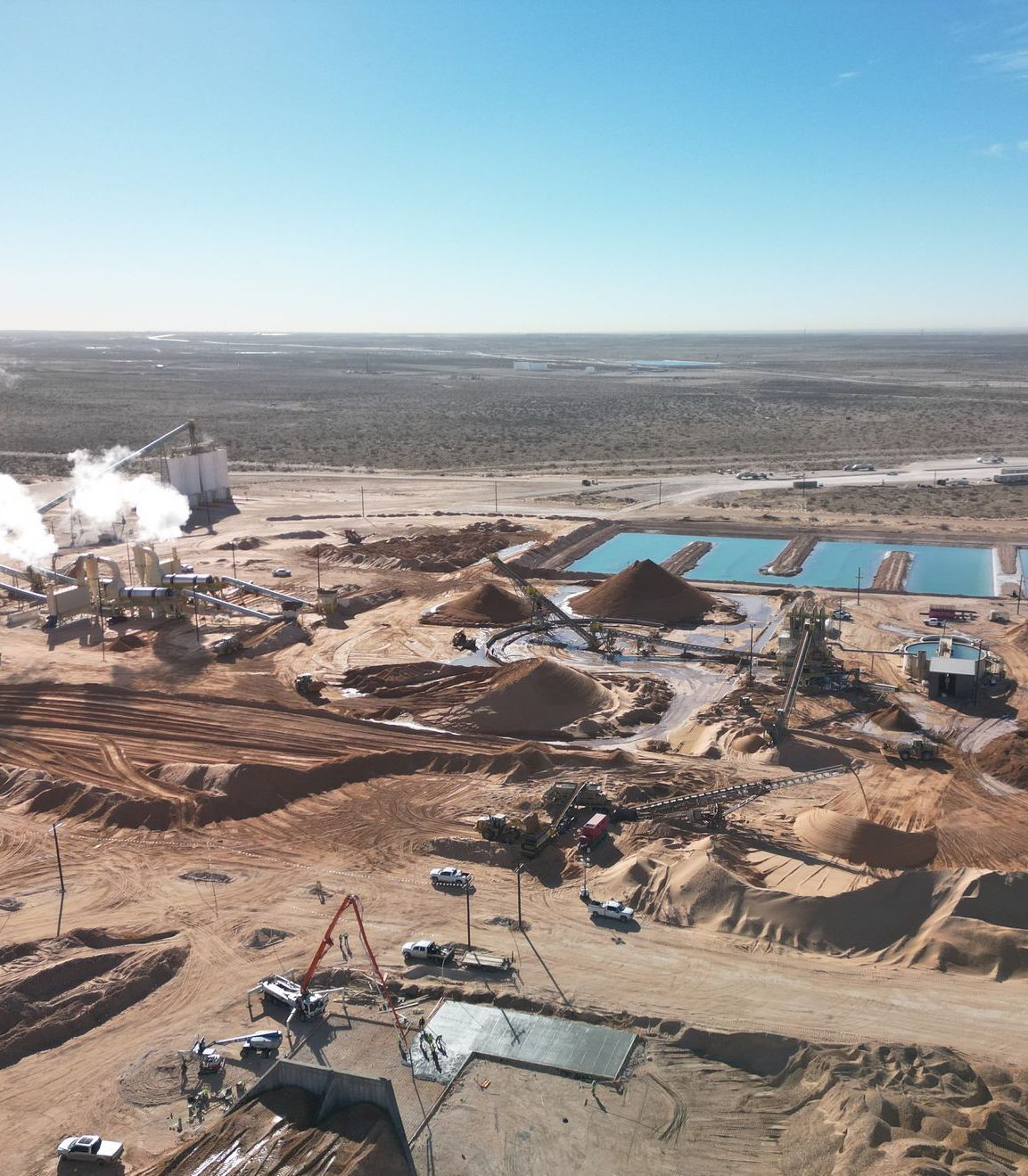 An aerial view of a construction site in the desert