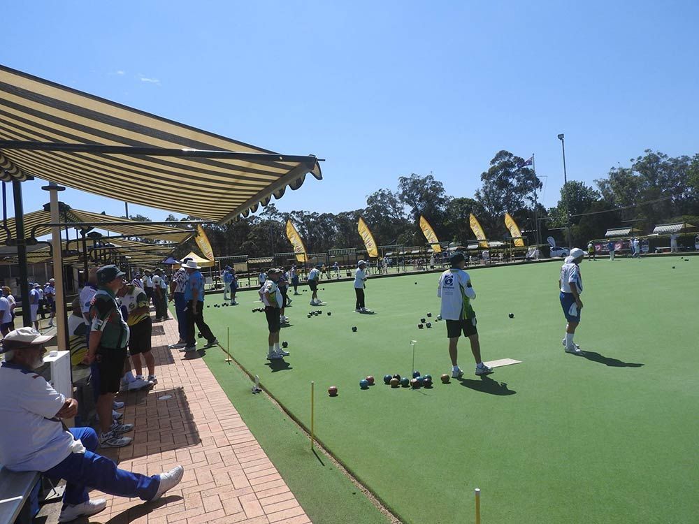 A Group Of People Are Playing A Game Of Bowling β Woongarra Motel In North Haven, NSW