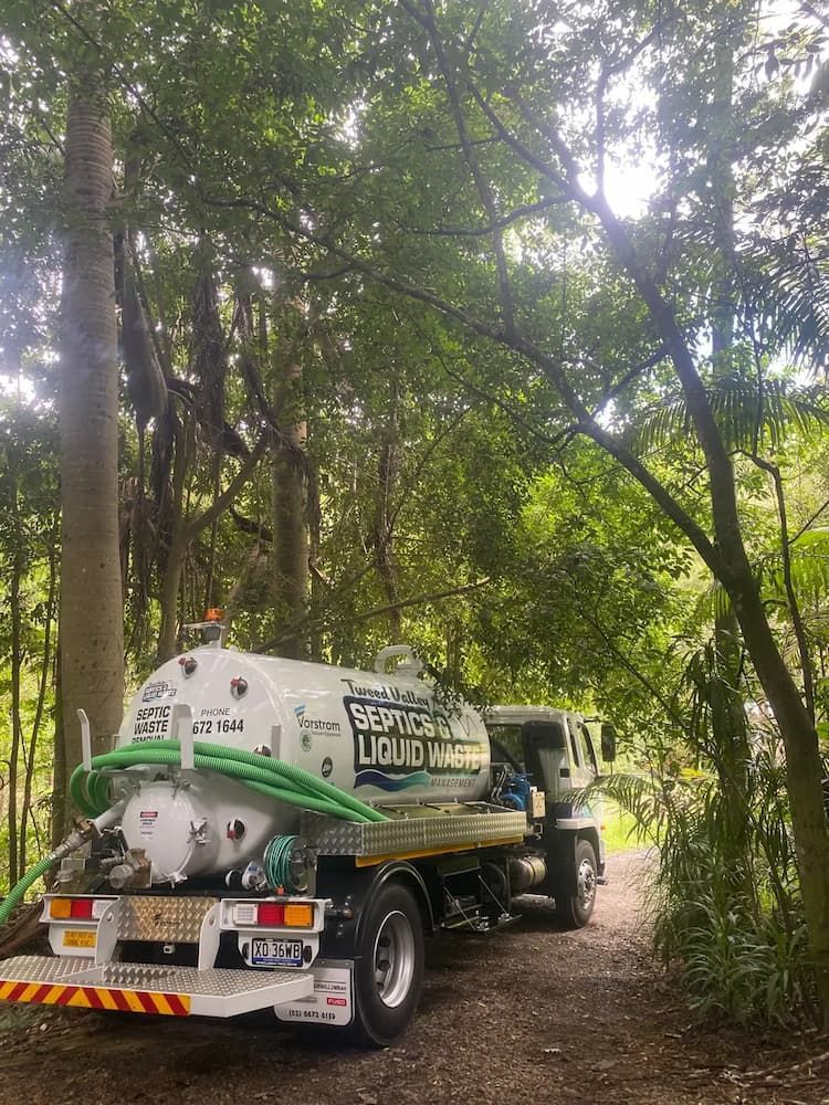 Vacuum Truck is Parked in the Middle of a Forest — Tweed Valley Septics & Liquid Waste Management in South Murwillumbah, NSW