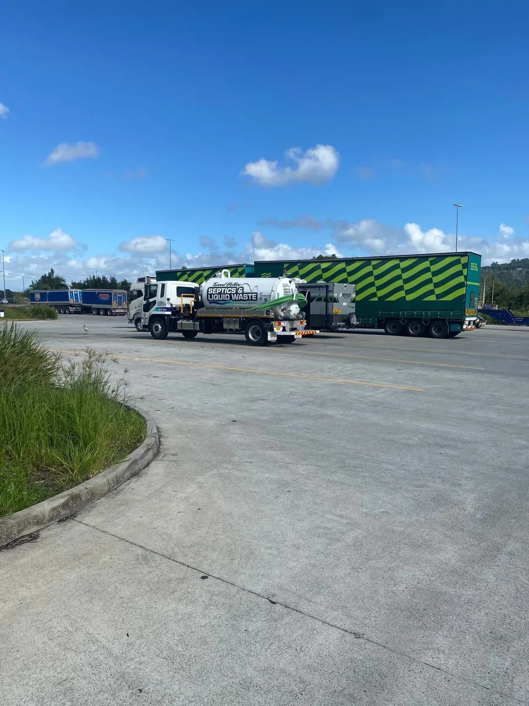 Row of Trucks Are Parked in a Parking Lot — Tweed Valley Septics & Liquid Waste Management in South Murwillumbah, NSW