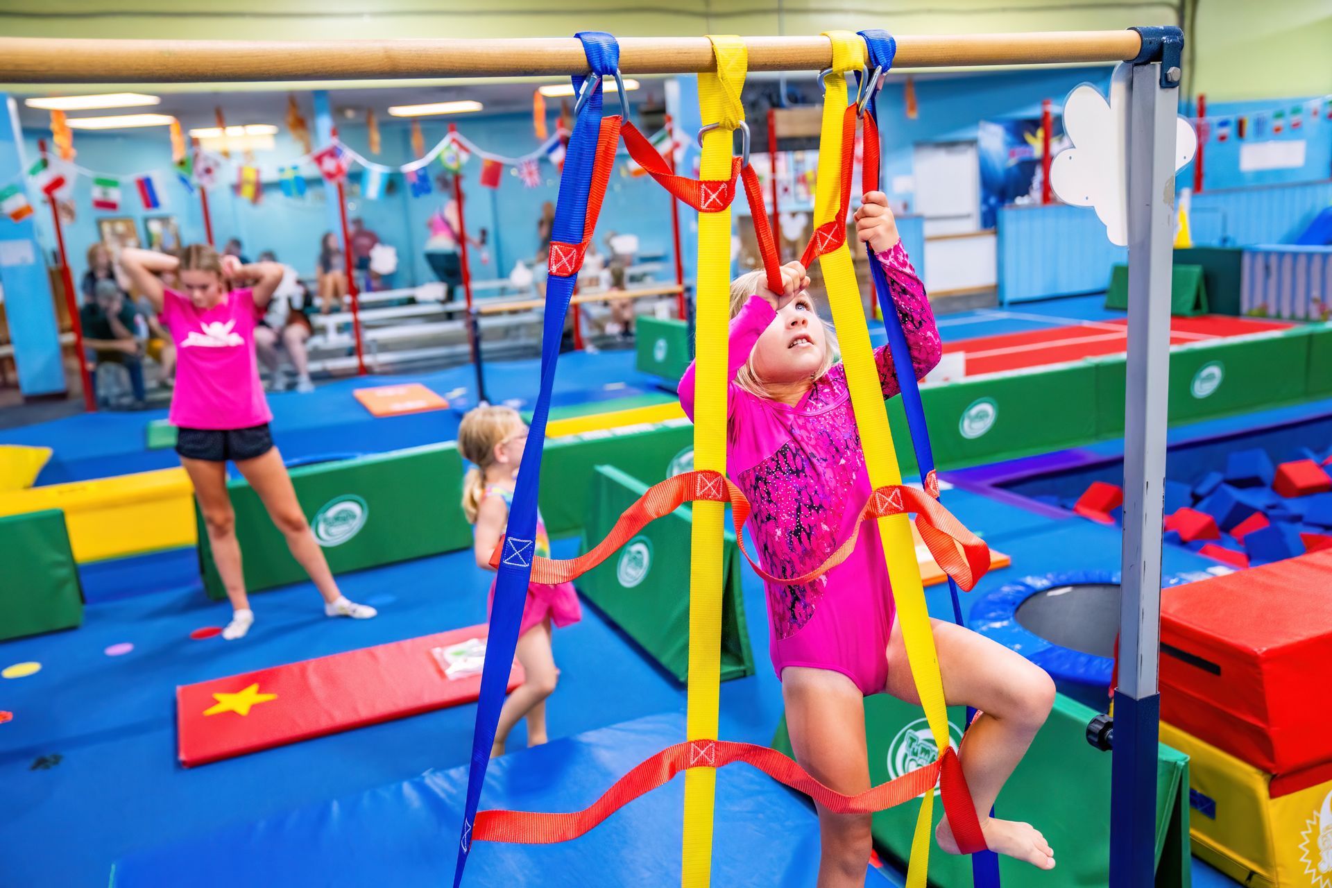 Tumble Bees recreational gymnastics girl climbing ladder