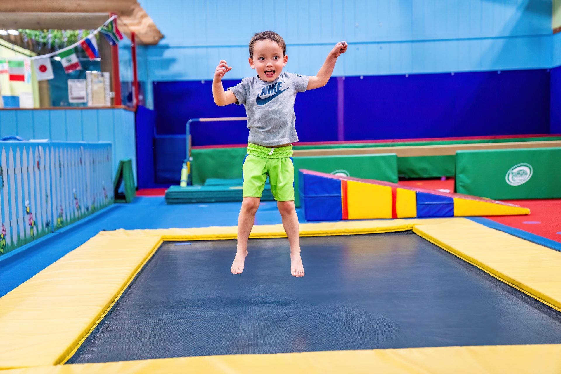 Young boy jumping trampoline