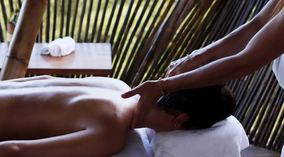A woman is getting a massage at a spa.