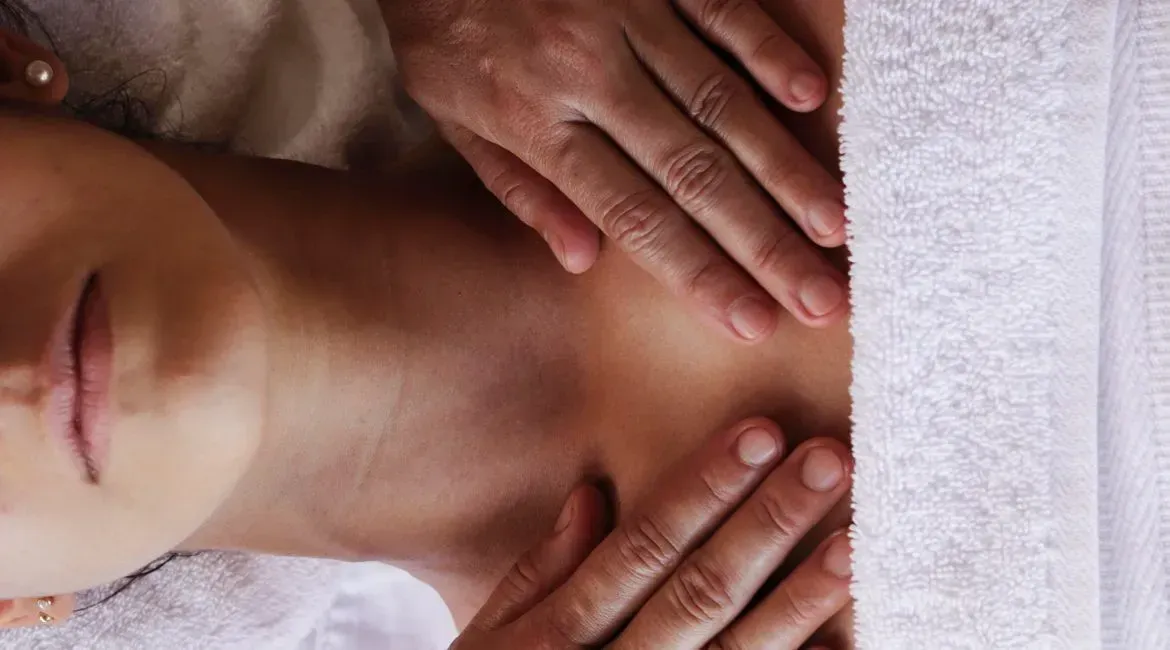 A woman is getting a massage at a spa.