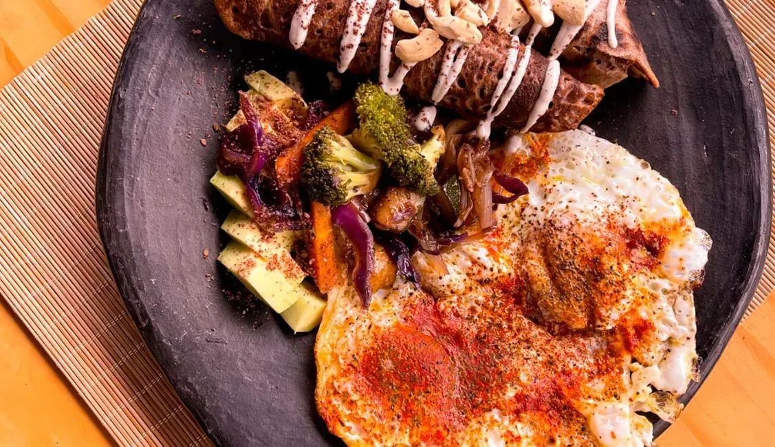 A close up of a plate of food on a table.