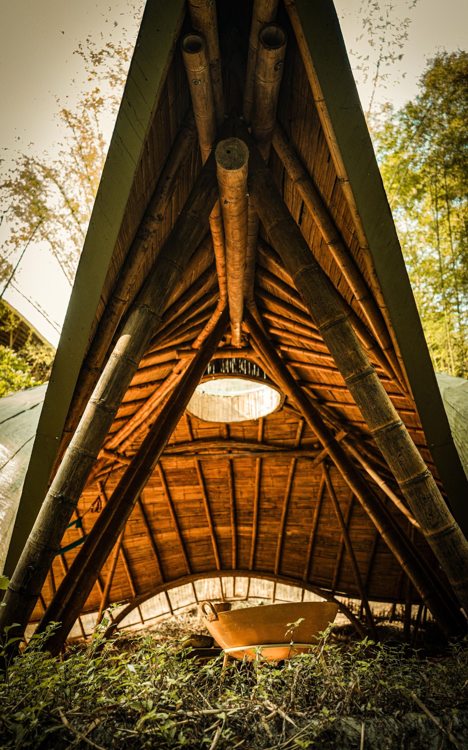 A wooden structure with a lamp hanging from the ceiling.
