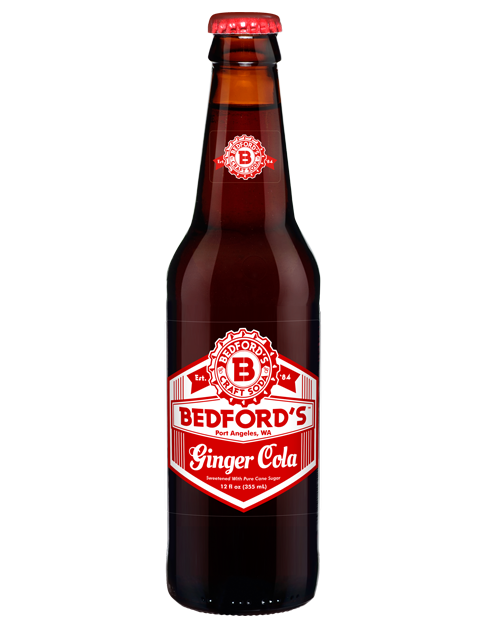 A bottle of bedford 's ginger cola on a white background.