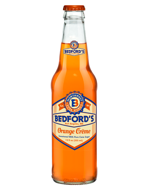 A bottle of bedford 's orange creme soda on a white background