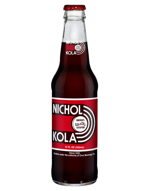 A bottle of nichols kola soda on a white background