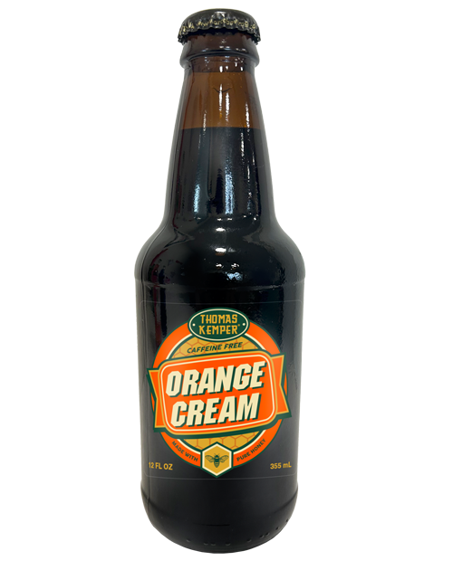 Bottle of Thomas Kemper Orange Cream soda, dark glass, orange and gold label.