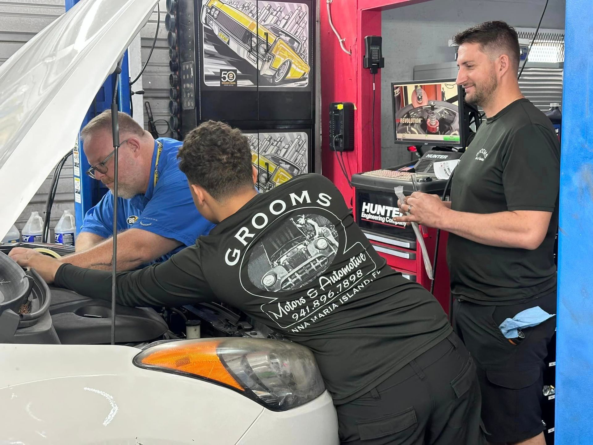 Team Working on Engine Repair | Grooms Motors & Automotive