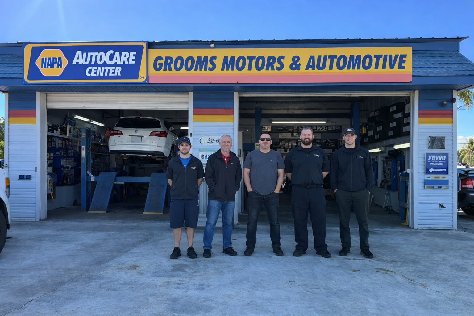 Team Members in front of the Shop | Grooms Motors & Automotive