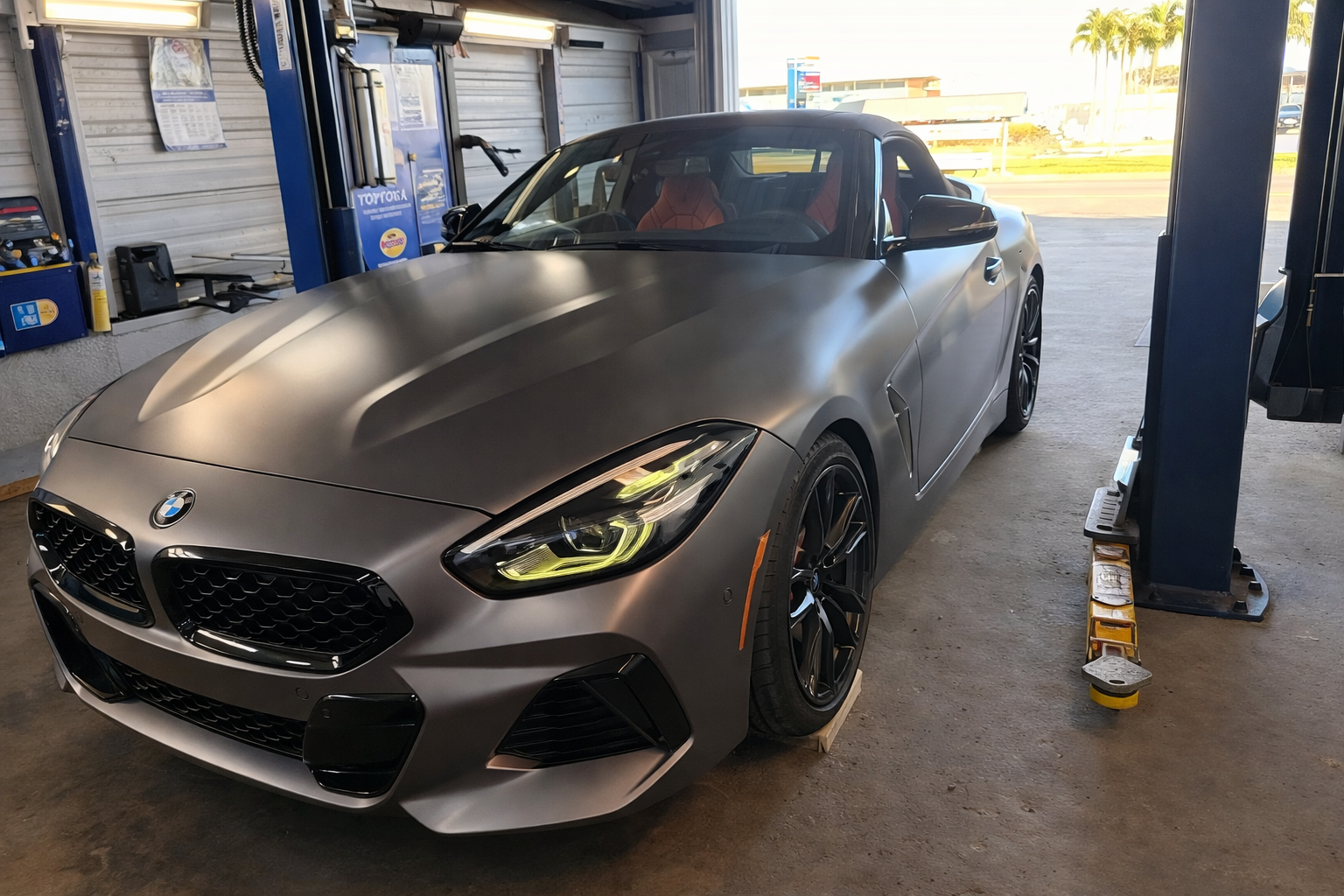 BMW Z4 in repair shop bay | Grooms Motors & Automotive