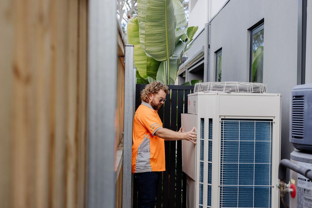 Win air and electrical installing ducted air conditioning outdoor unit