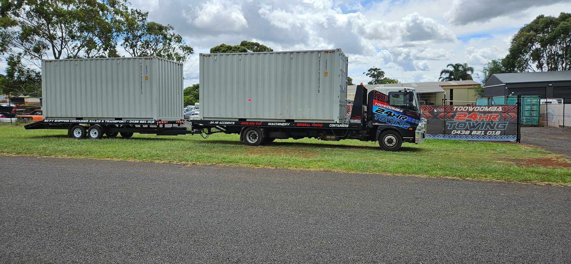 Tow Truck With a Forklift on the Back is Parked in Front of a Building — Toowoomba 24hr Towing in Crows Nest, QLD