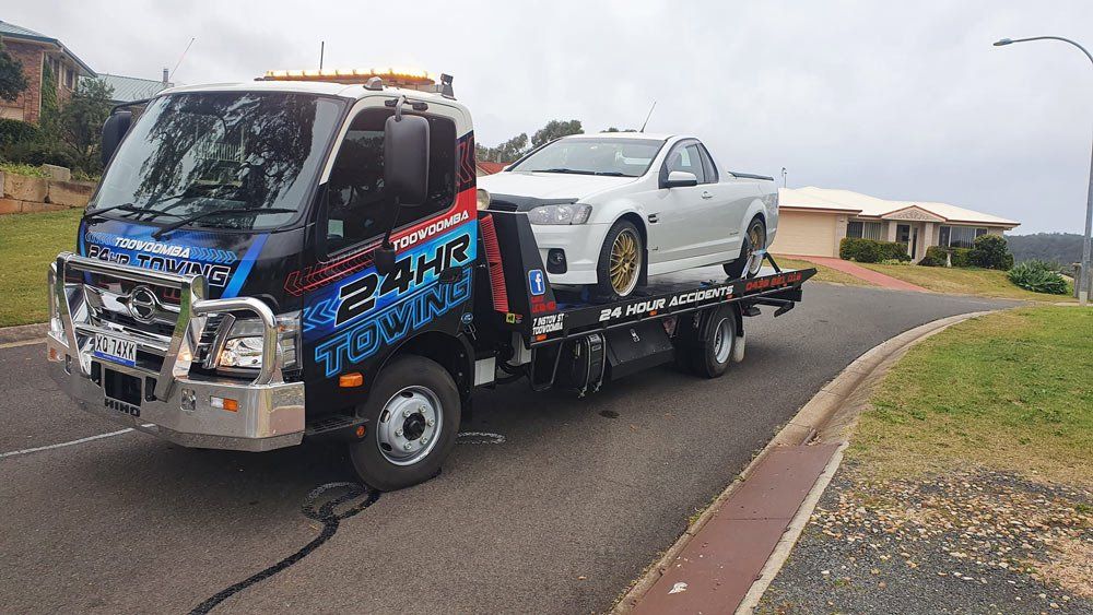 Tow Truck Transporting The White Car — Toowoomba 24hr Towing In Toowoomba, QLD