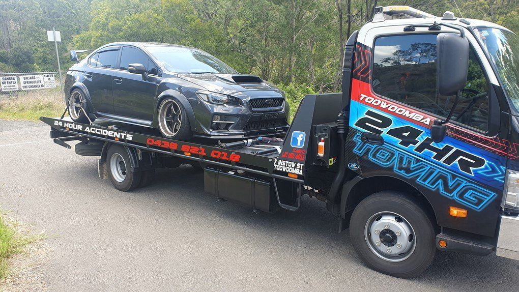 Towing A Black Car — Toowoomba 24hr Towing In Toowoomba QLD
