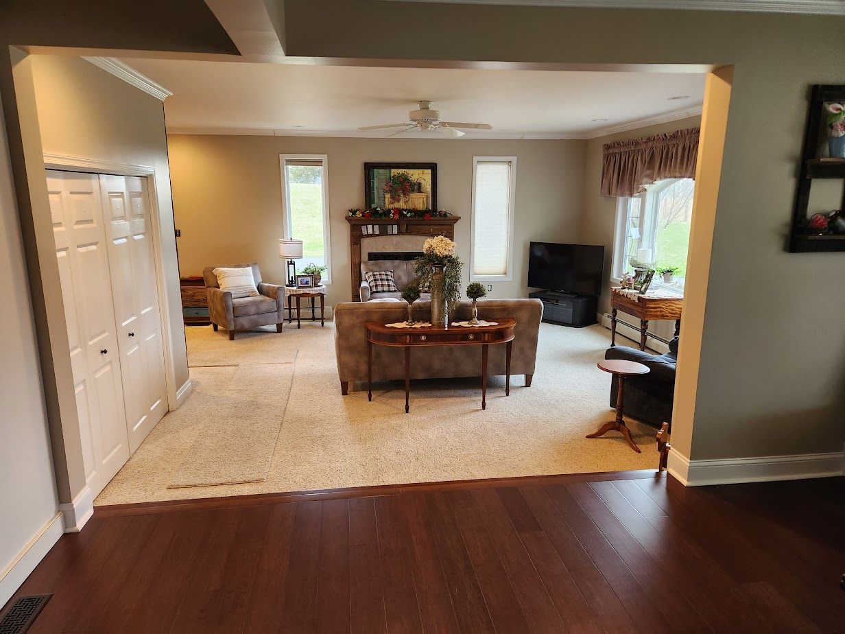 A living room with a fireplace and a couch