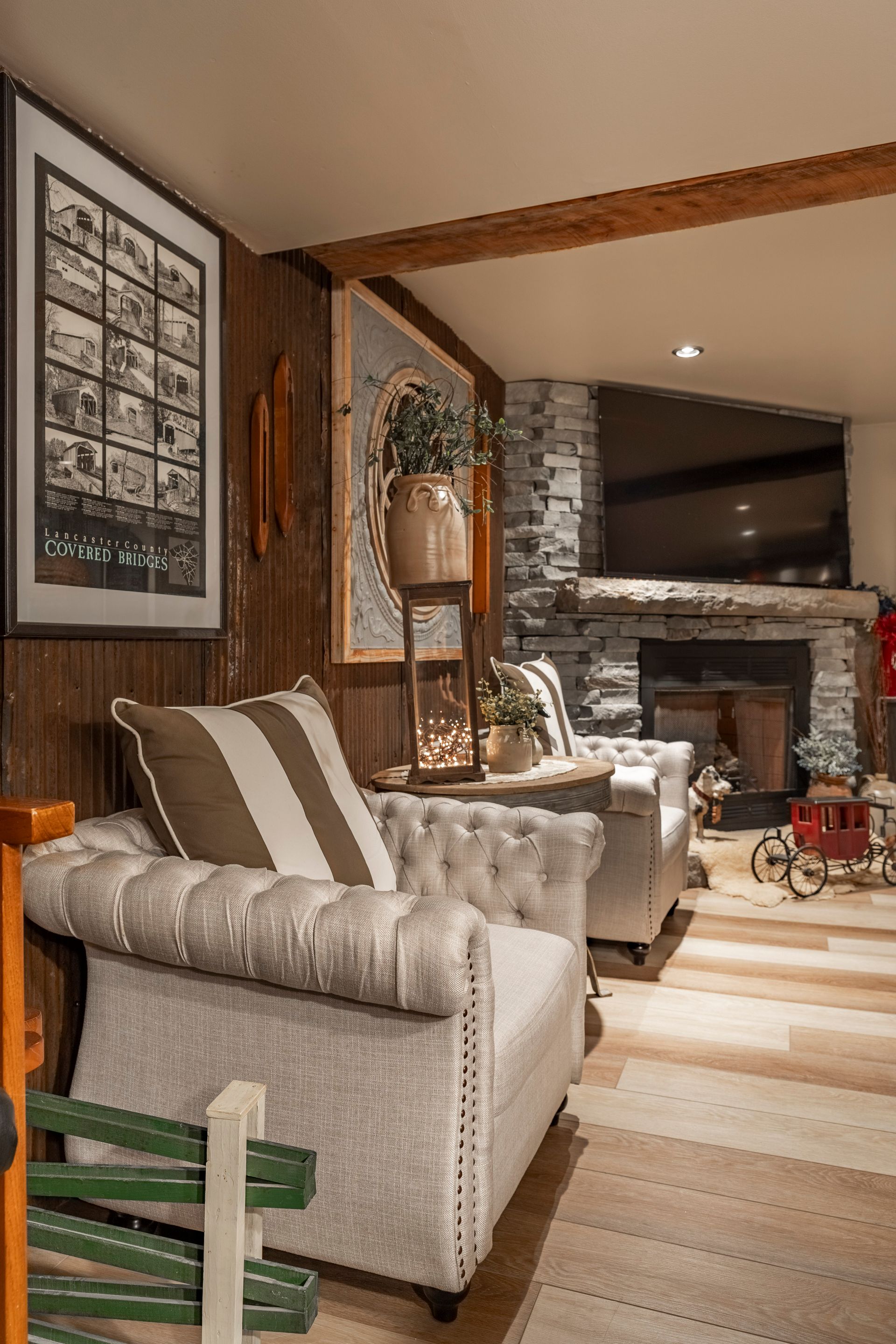 A living room filled with furniture and a fireplace.