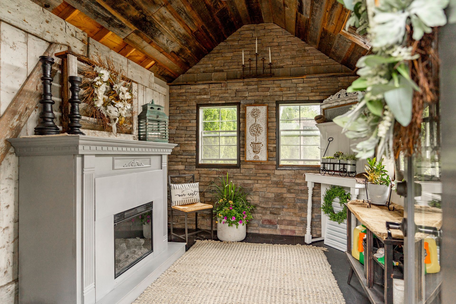 There is a fireplace in the middle of the room.