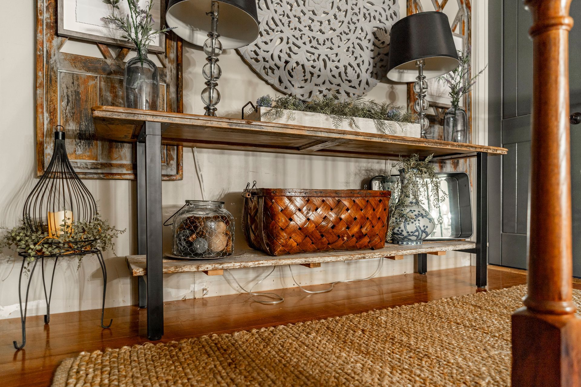 A wooden table with a basket on top of it in a living room.