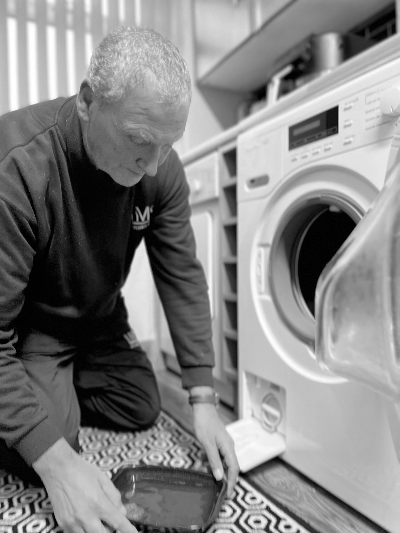 Martin is draining a washing machine