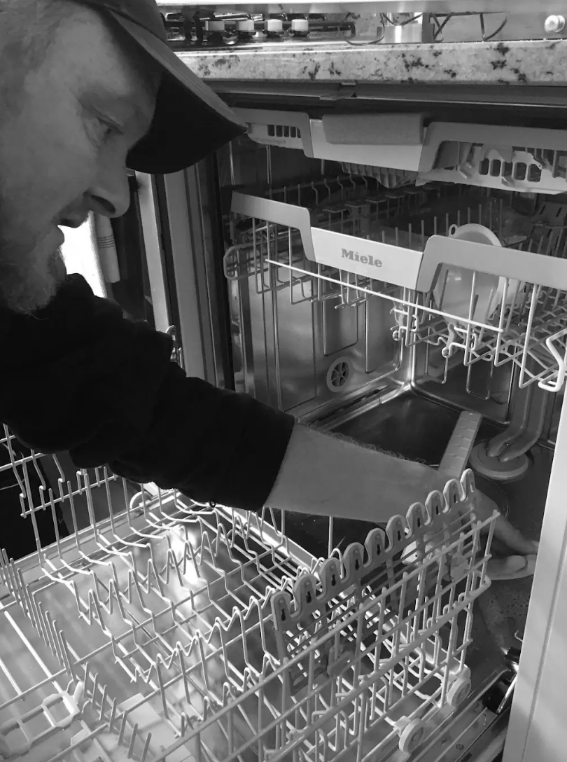 Stephen is working on a Miele dishwasher in Bristol