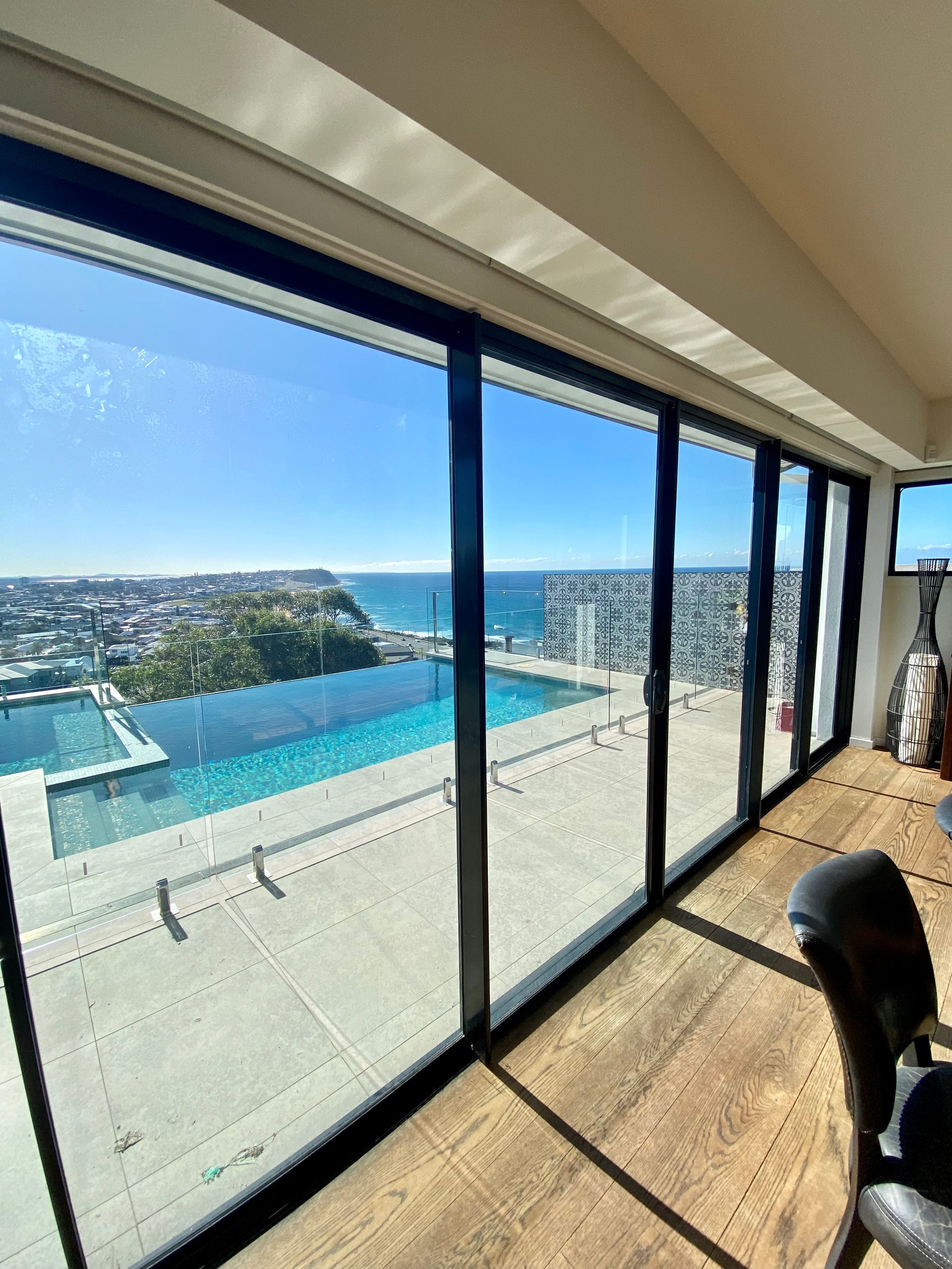 Large Glass Windows Overlooking A Pool — Fix-A-Door in Terrigal, NSW