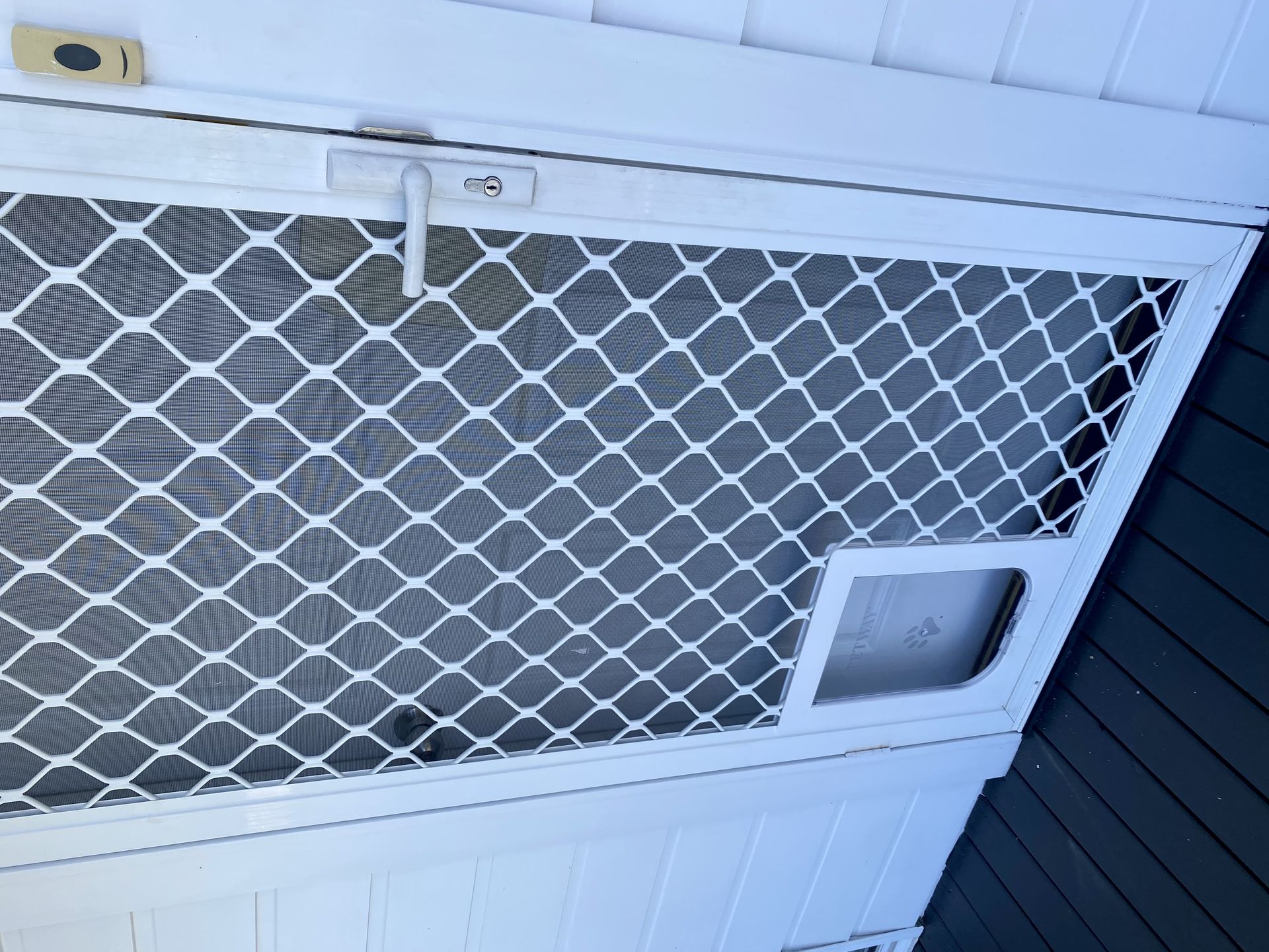 White Security Door With Metal Screen And Pet Door — Fix-A-Door in Terrigal, NSW