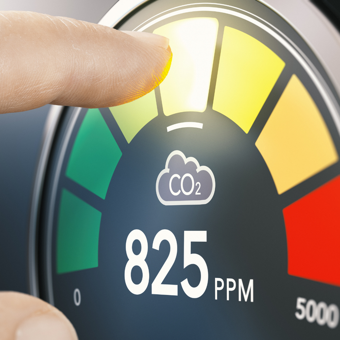 A person pressing a button that says co2 on it