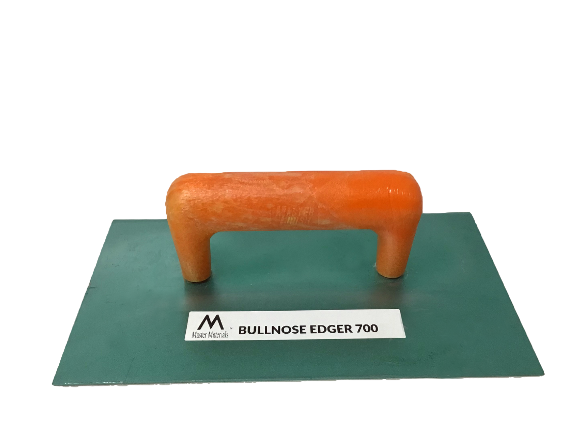 Orange-handled bullnose edger tool on a green rectangular surface, labeled 