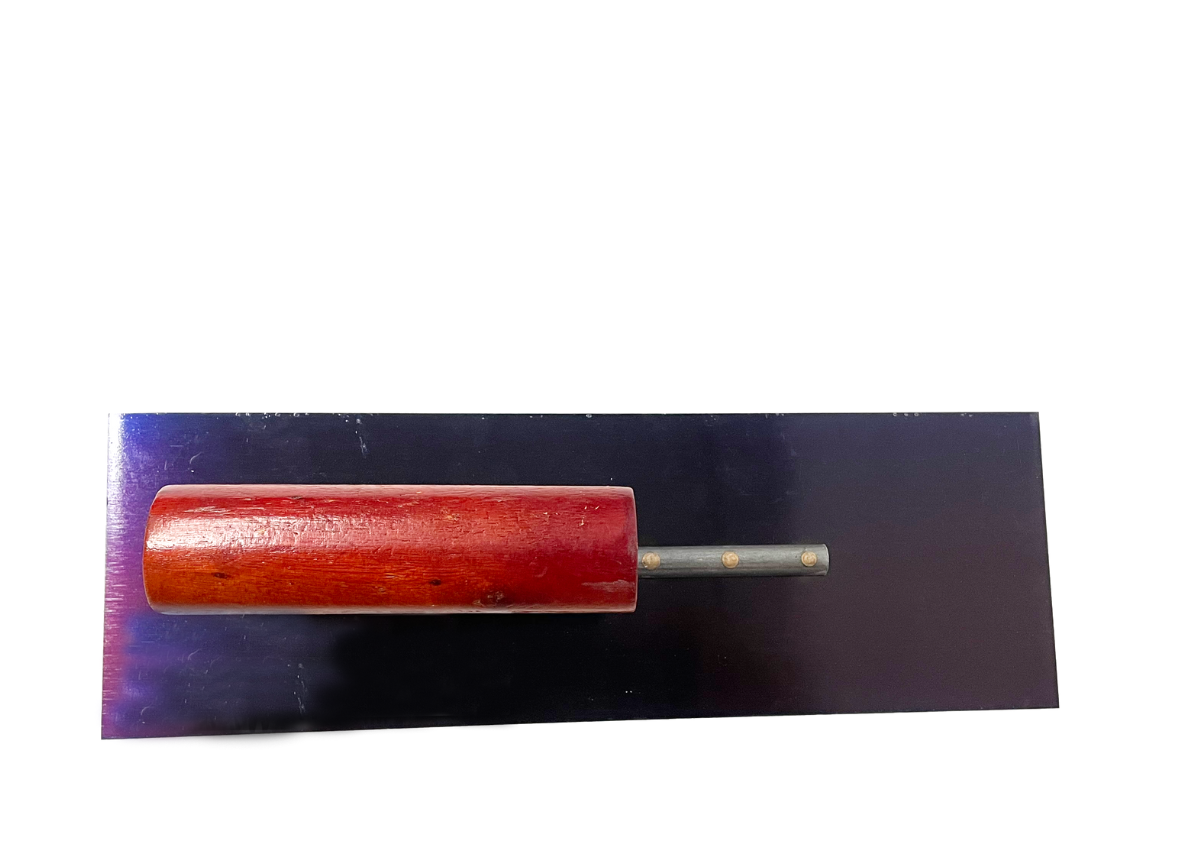 Trowel with a red wooden handle and a dark rectangular blade.